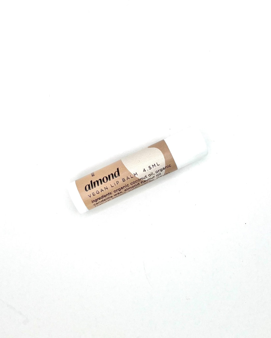 66329a1d0759253713889ea6_almond-lip-balm-1_1757009942387.jpg
