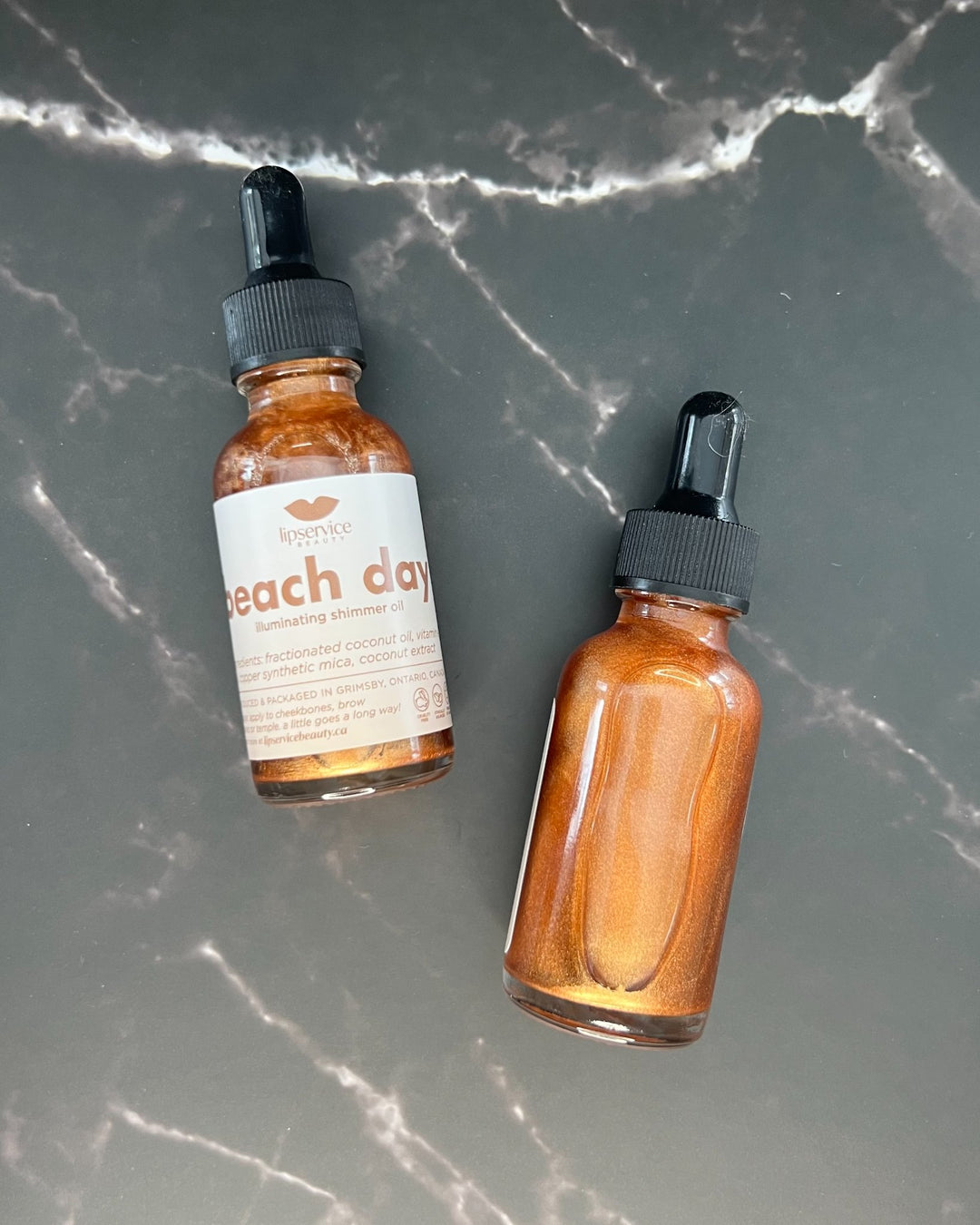 66329a1d0759253713889ea6_beach-day-illuminating-body-oil-_1780911449756.jpg