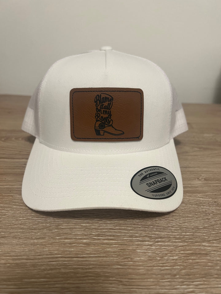 White Trucker Hat Blame it all on Roots