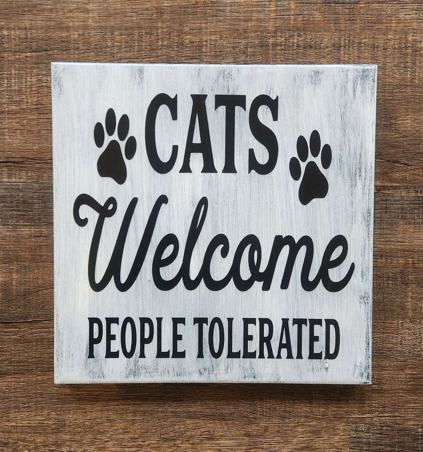 Cats welcome, people tolerated sign