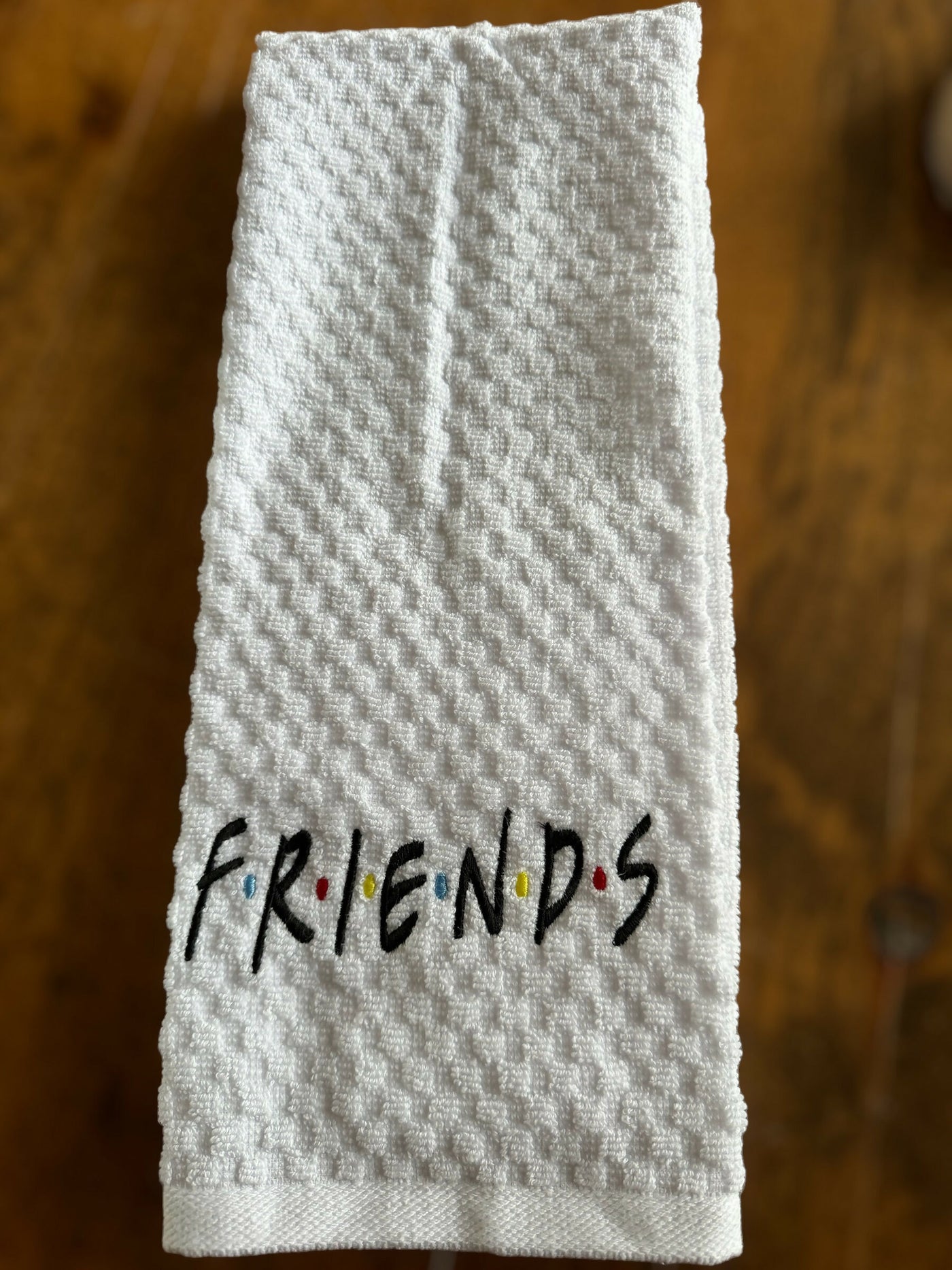 Friends embroidered kitchen towel