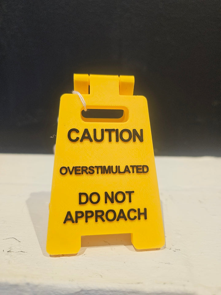 Overstimulated Caution Sign